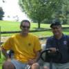 Lions Ken and Charlie take refreshments around to all golfers